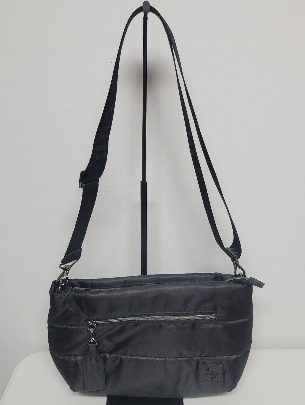 Lug Moonwalk Crossbody Bag In Black.